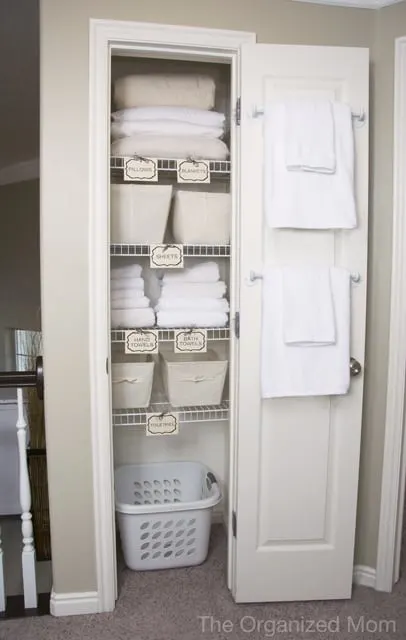 Linen Closet Organization with Baskets: A simple way to eliminate visual  clutter - Organizing Moms