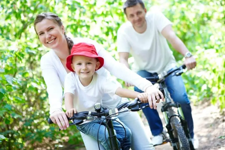 family riding bikes