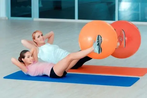 mom and daughter exercising