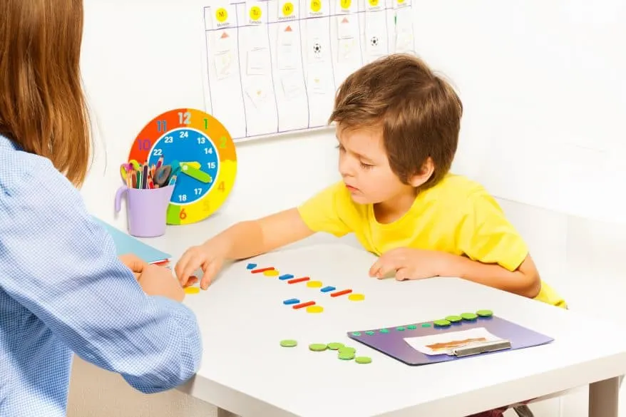 mom teaching boy 