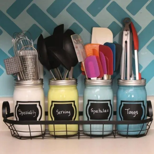 kitchen utensils stored in jars