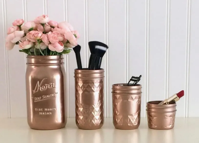 makeup brushes in jars