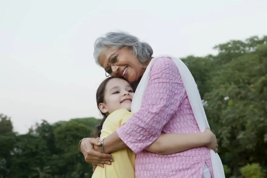 child hugging grandmother