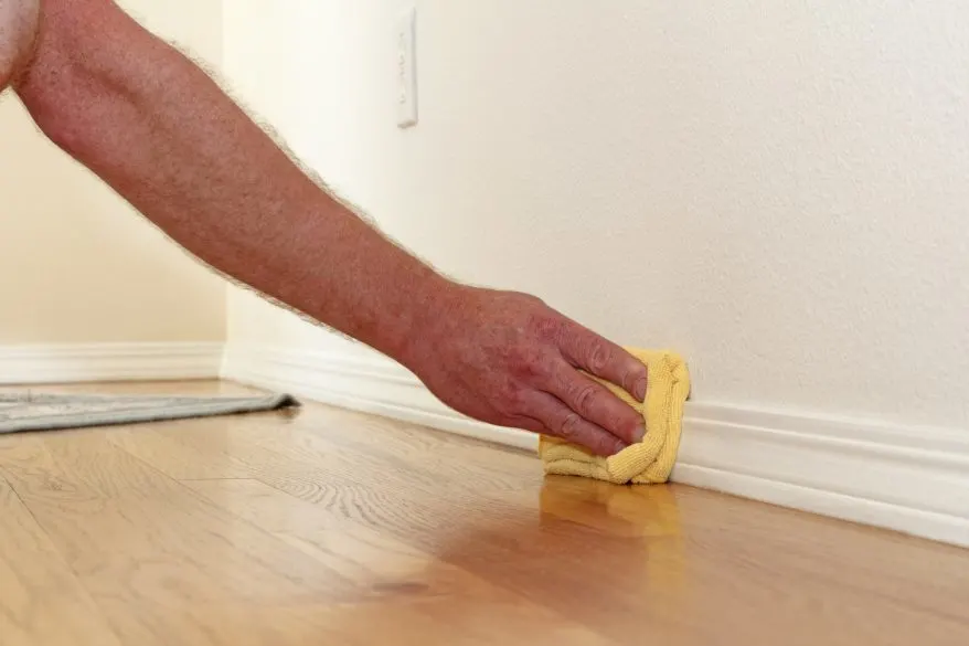 cleaning baseboards