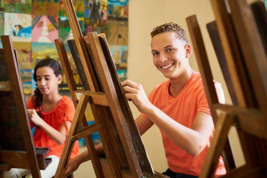 teen boy painting