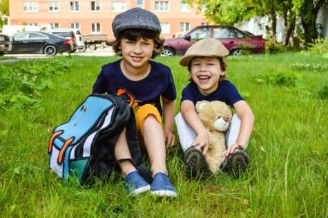 two boys with backpacks