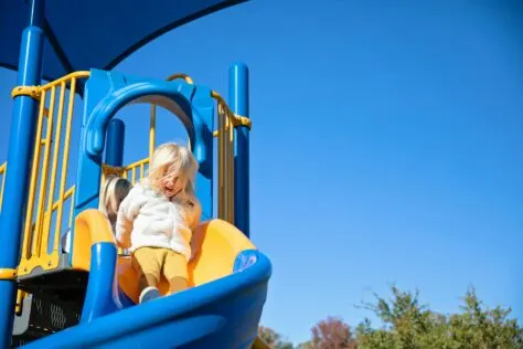 toddler on slide activities for 2-year-olds