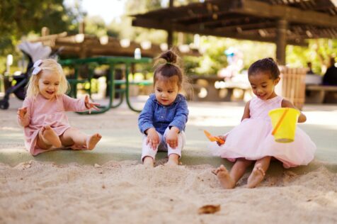 toddlers in sand box activities for 2-year-olds