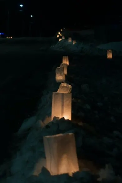 Lunch sack luminaries in a row.