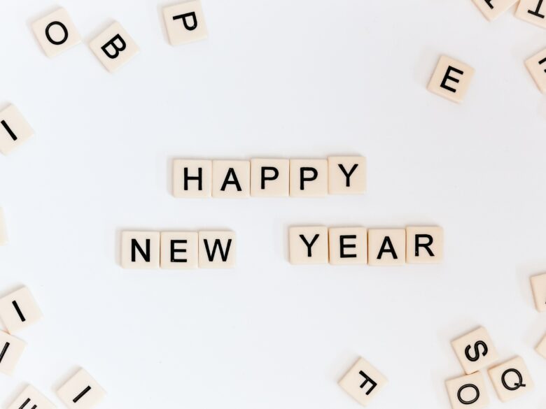 Letter tiles spelling out "Happy New Year"