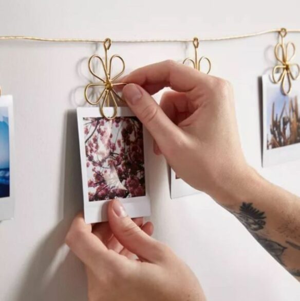 hanging a picture on a rotating photo display