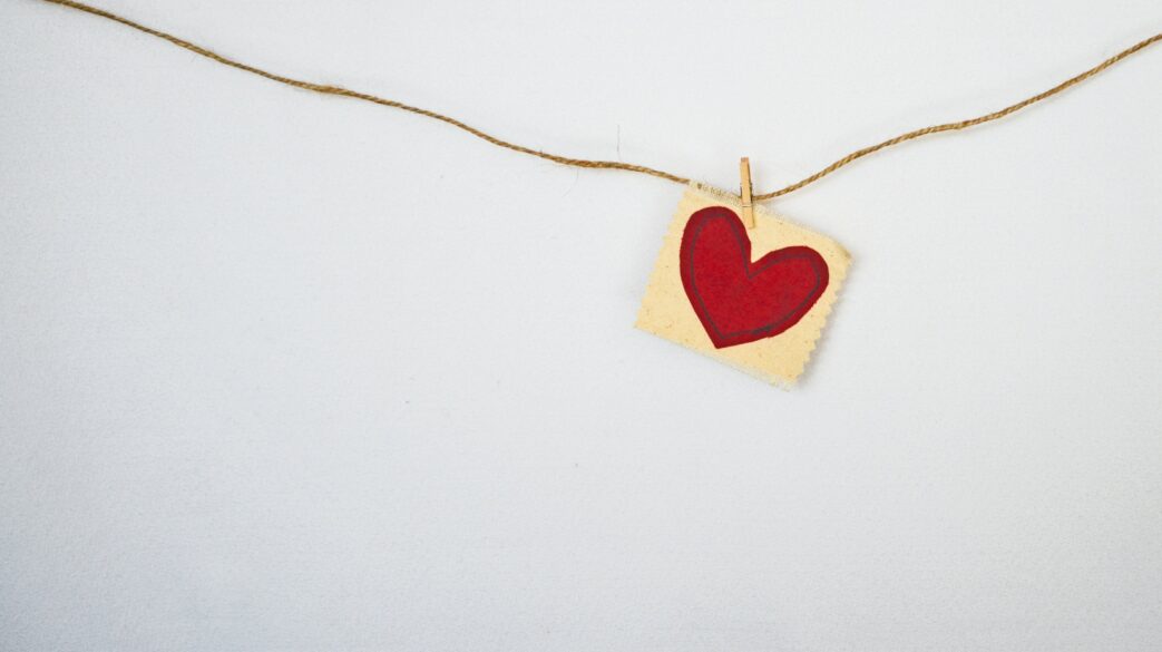 A heart hanging from a string.