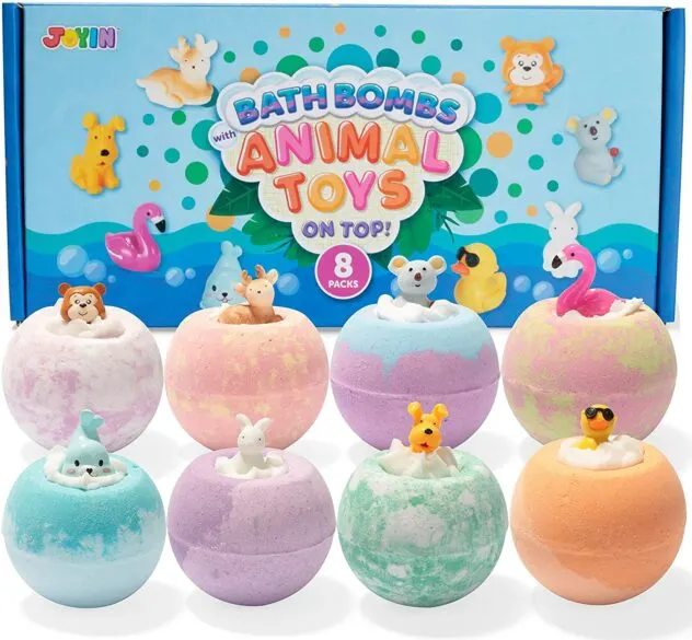 8 bath bombs with a small toy on top.