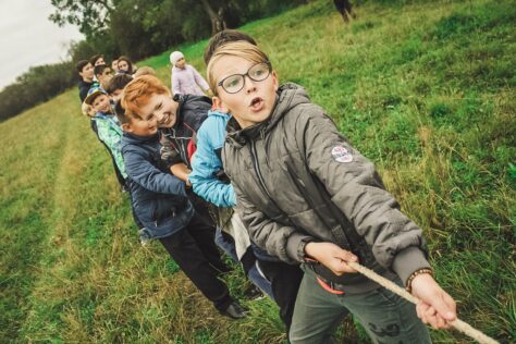 tug of war; send kids to summer camp