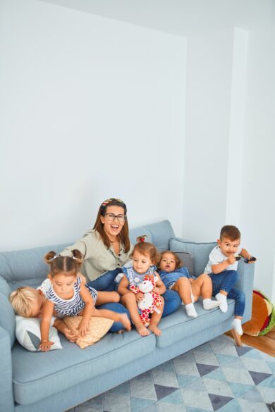 Kids sitting on a couch.