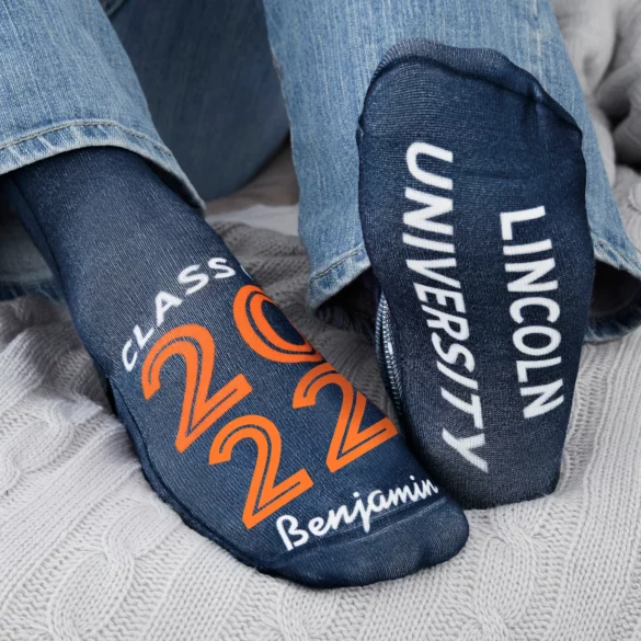 Socks with a name, graduation year and school on them.