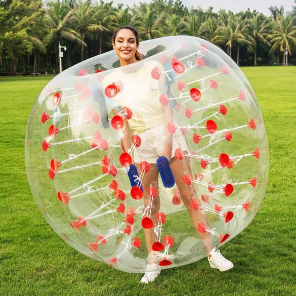 A lady standing in a bubble ball.