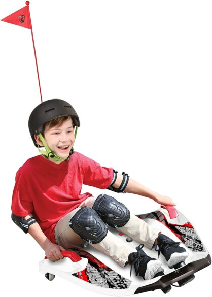 A child riding on a Nighthawk electric ride.