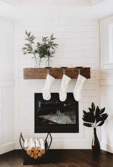 Stockings hung in front of the fireplace.