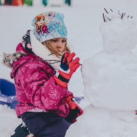 girl with snowman