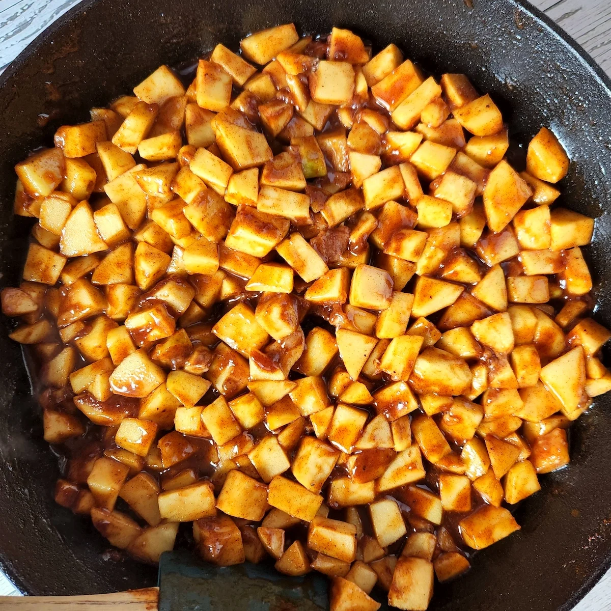 making apples for apple cobbler recipe made with cake mix