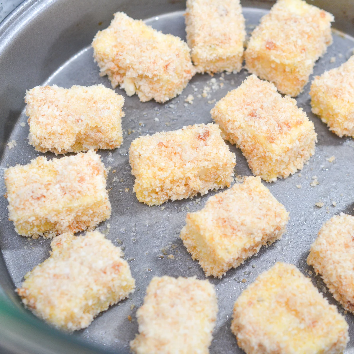 keto mozzarella sticks in pan for air fryer