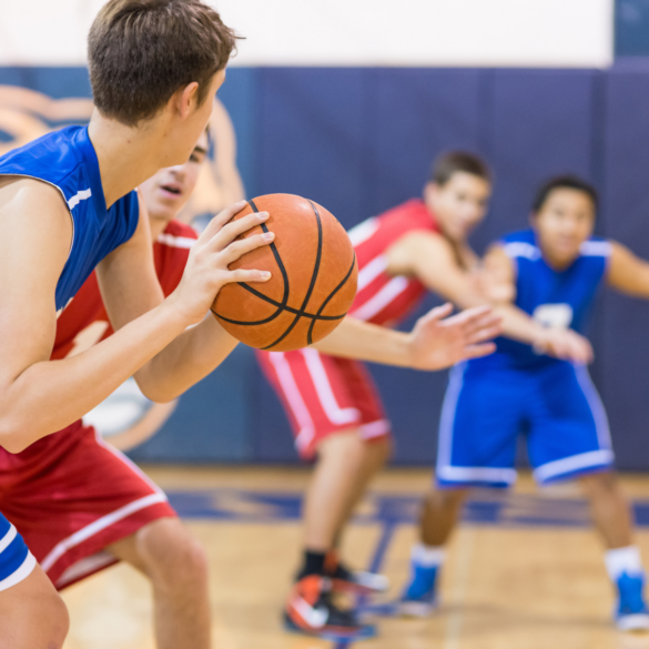 boys playing basketball; homeschooled kids play college sports