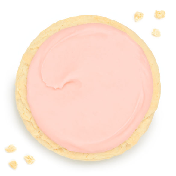 A large pink frosted Crumbl sugar cookie