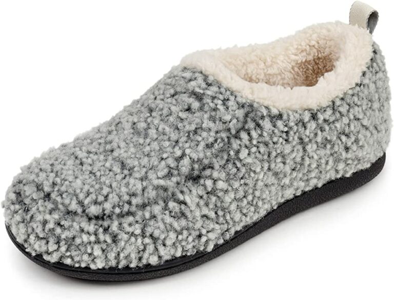 A fuzzy slipper with a hard sole.