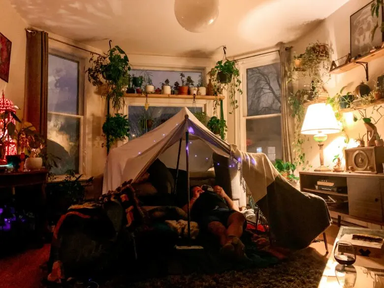 People inside a fort in the house. Six Fun DIY Summer Activities