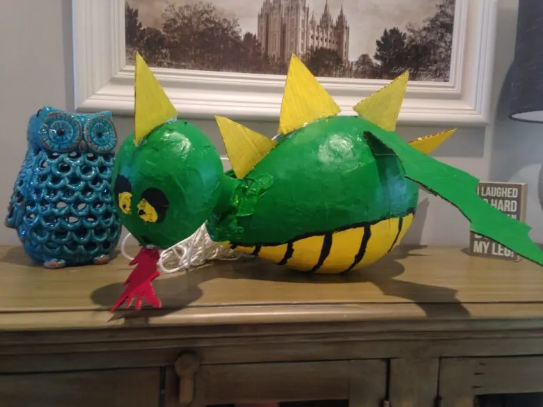 A paper mache dragon piñata.