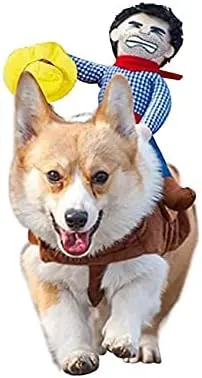 A dog with a Halloween costume of a cowboy riding on the dog’s back.