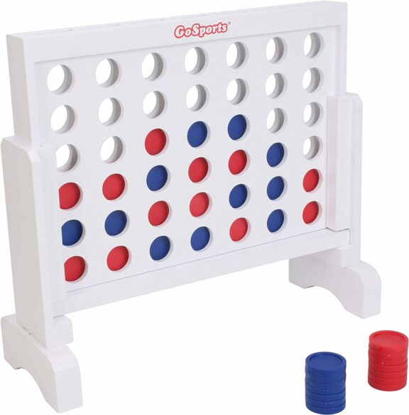 A large white Connect 4 type game with red and blue coins.