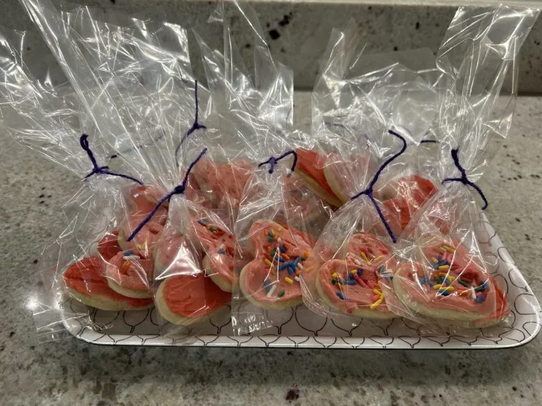 A tray with sugar cookies individually bagged.