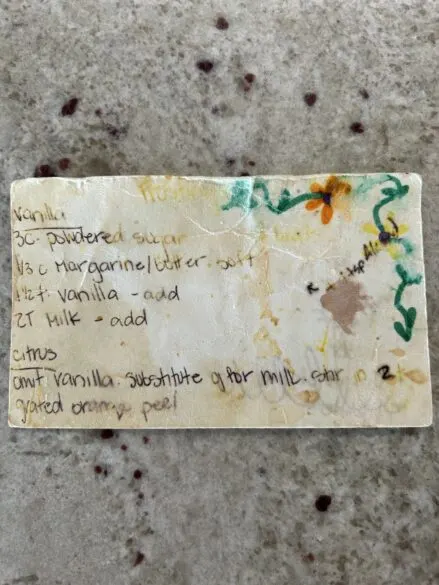 Written on recipe card with a frosting recipe.