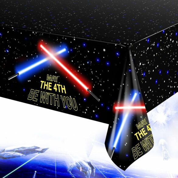 A black tablecloth with stars and the words, "May the 4th be with you".