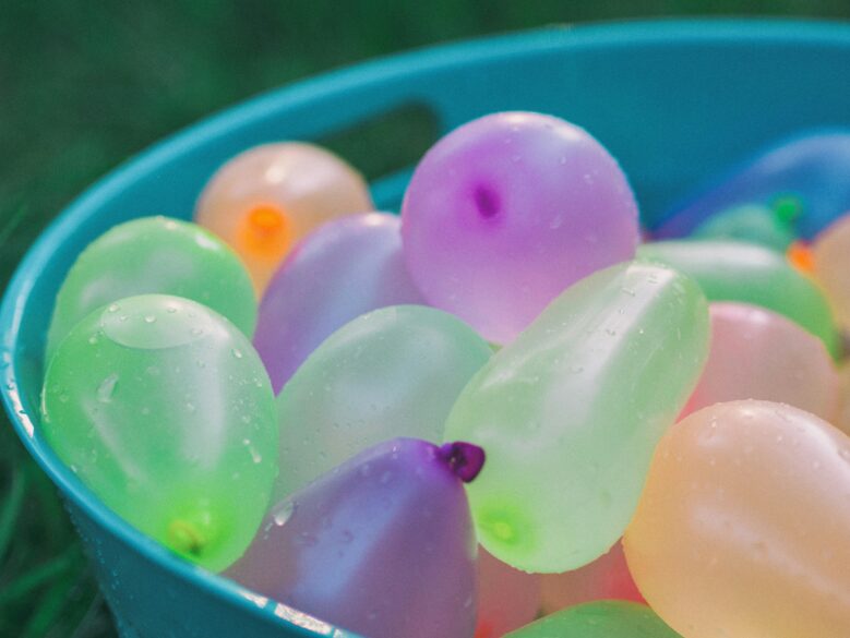A tub filled with water balloons.
